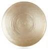 A gold glass dessert plate with a textured, concentric ring pattern. Podgląd zdjęcia produktu