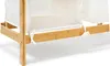 Close-up of a section of a laundry basket frame made of bamboo, with white fabric lining. Náhled obrázku produktu