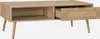 A light brown wooden coffee table with one open drawer and one open shelf, shown against a white background. Produktbild-Vorschau