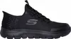 A black Skechers shoe is shown from the side against a white background. Podgląd zdjęcia produktu