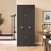 A dark gray cabinet with brass hardware stands in a room with a staircase and a dining table. Podgląd zdjęcia produktu