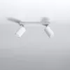 A white ceiling light fixture with two adjustable spotlights mounted on a bar. Náhled obrázku produktu