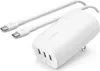 A white Belkin BoostCharge power adapter with two white USB-C cables attached. Produktbild-Vorschau