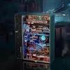 A detailed 3D model of a futuristic city, presented as a marble run puzzle, illuminated with blue and orange lights against a dark, urban background. Produktbild-Vorschau