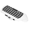A white and black mini keyboard with a USB connector. Produktbild-Vorschau