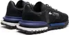 A pair of black Lacoste sneakers shown from a rear-side diagonal angle. Produktbild-Vorschau