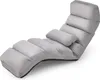 A light gray floor chair with a pillow, shown from a side angle on a white background. Anteprima dell’immagine prodotto