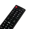 A close-up view of a black remote control with various buttons. Podgląd zdjęcia produktu