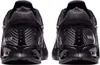 The back view of two black Nike sneakers. Voir les images du produit
