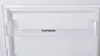 Close-up of a shelf inside a white appliance, possibly a refrigerator or freezer. Produktbild-Vorschau