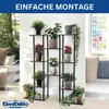 A multi-tiered metal and wood plant stand filled with various potted plants, set against a white wall with a window in the background. Podgląd zdjęcia produktu