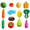 A collection of wooden toy fruits and vegetables, cut in half and arranged in rows on a white background. Náhled obrázku produktu