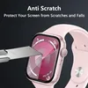 A close-up of a pink smartwatch with a screen protector being tested with a utility knife. Produktbild-Vorschau
