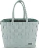 A light blue woven tote bag with two handles, shown from the front against a white background.