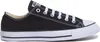 A side view of a black Converse All Star sneaker with white laces and a white sole. Voir les images du produit