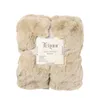 A folded beige faux fur throw blanket on a white background. Produktbild-Vorschau