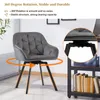 A gray velvet swivel chair with black legs, shown in a room setting with a bookshelf in the background. The image highlights the chair's 360-degree rotation feature with an orange circular arrow graphic. Voir les images du produit