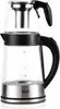 A clear studio shot of a glass electric tea maker with a stainless steel base and a black handle. Produktbild-Vorschau
