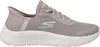 A side view of a single beige Skechers sneaker on a white background. Voir les images du produit