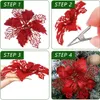 A four-panel image demonstrating how to attach a decorative Christmas flower to a Christmas tree using a clip. Produktbild-Vorschau