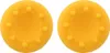 Two yellow controller thumb grips are shown against a white background. Produktbild-Vorschau