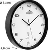 A black and white analog wall clock with a black frame, shown from a side angle. Produktbild-Vorschau