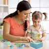 A mother and daughter are playing with a toy record player. Náhľad obrázku produktu