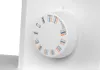A close-up view of a sewing machine's stitch selection dial. Produktbild-Vorschau