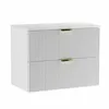 A white vanity cabinet with fluted fronts and gold handles, shown against a white background. Podgląd zdjęcia produktu