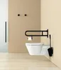 A modern bathroom with a wall-mounted toilet, grab bar, and toilet paper holder. Produktbild-Vorschau