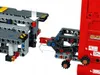 A close-up view of two LEGO Technic components, likely from a vehicle set, being connected. Anteprima dell’immagine prodotto