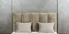 A close-up of a headboard with two pillows. Náhľad obrázku produktu