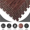 A close-up view of stacked puzzle mats with a wood grain pattern, accompanied by icons and text describing product features. Náhľad obrázku produktu