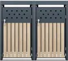 A front view of two adjacent grey metal and wood trash bin enclosures with doors. Produktbild-Vorschau