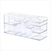 A set of clear plastic food storage containers with white lids, arranged in a row on a white background. Produktbild-Vorschau