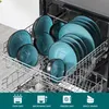 A dishwasher rack filled with blue and green ceramic dishes. Voir les images du produit