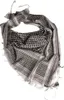 A black and white patterned scarf laid out on a white background. Náhled obrázku produktu
