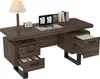 A dark brown wooden desk with black metal legs, shown from a slightly elevated angle against a white background. The desk features a laptop, a lamp, books, a digital clock, and several drawers, one of which is open to reveal files. Podgląd zdjęcia produktu