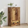 A wooden highboard cabinet with two drawers and two doors, placed against a white wall with a plant to the left and curtains to the right. Produktbild-Vorschau