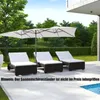 A patio scene with lounge chairs and a large umbrella. Náhled obrázku produktu