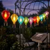 Guirlande lumineuse solaire : 10 montgolfières colorées Voir les images du produit 1