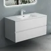 A white wall-mounted bathroom vanity with a sink and faucet, set against a gray wall and floor. Produktbild-Vorschau