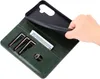 A hand is shown placing a phone case into a wallet-style phone case that has slots for cards and cash. Produktbild-Vorschau