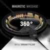 A close-up, angled view of a black massage hula hoop with gold massage nodes, set against a dark background with light rays. Náhled obrázku produktu