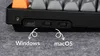 A close-up view of the bottom edge of a mechanical keyboard, showing connection ports and labels indicating compatibility with Windows and macOS. Produktbild-Vorschau