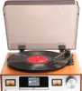 A retro-style music system with a turntable, CD player, and display screen. Produktbild-Vorschau