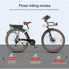 A white electric bicycle with a black frame and brown accents, displayed with text and icons explaining its three riding modes. Produktbild-Vorschau