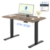 A standing desk with a computer, keyboard, and a vase of flowers on top. Blue wireframe diagrams show the desk's lifting mechanism. Náhled obrázku produktu