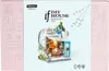 The image shows the packaging of a DIY miniature house kit. Anteprima dell’immagine prodotto