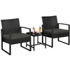 Two black rattan chairs and a small black table with drinks and snacks on a white background. Podgląd zdjęcia produktu